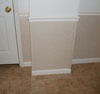 A closeup of our completed drywall repair system.  On the floor are our warranted ThermalDry parquet floor tiles.