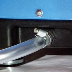 A self-draining crawl space dehumidifier connected to a sump pump system in New Castle