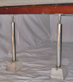 Crawl space jack posts installed in conjunction with a crawl space vapor barrier in Malvern