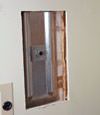 Wall anchor plates installed during a foundation repair in Wilmington in a finished basement