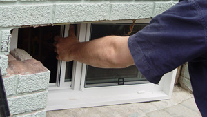 Installing new windows in a Wilmington finished basement