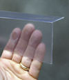 Closeup of a clear plastic covering on a Gwynn Oak crawl space block wall