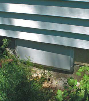 A gray crawl space vent cover in Bear