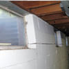 A foundation showing severe inward buckling along the windows