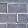 A diagonal stair-step crack found along a foundation wall