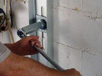 Mounting a foundation wall channel anchor in Lancaster.