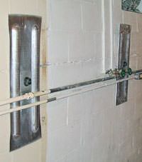 A foundation wall anchor system used to repair a basement wall in Media