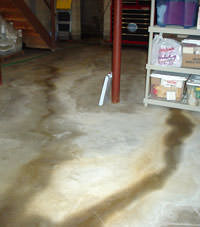 Flooding entering a basement through a floor crack in Nottingham