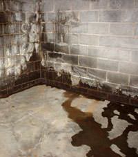 Water seeping through a concrete wall in a Lutherville Timonium basement
