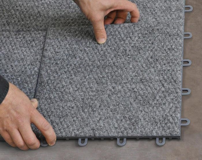 Installing basement floor tiles in a renovated basement
