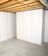 Fiberglass insulated basement wall system in Essex, PA, DE, and MD