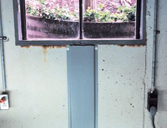 Repaired waterproofed basement window leak in Upper Darby